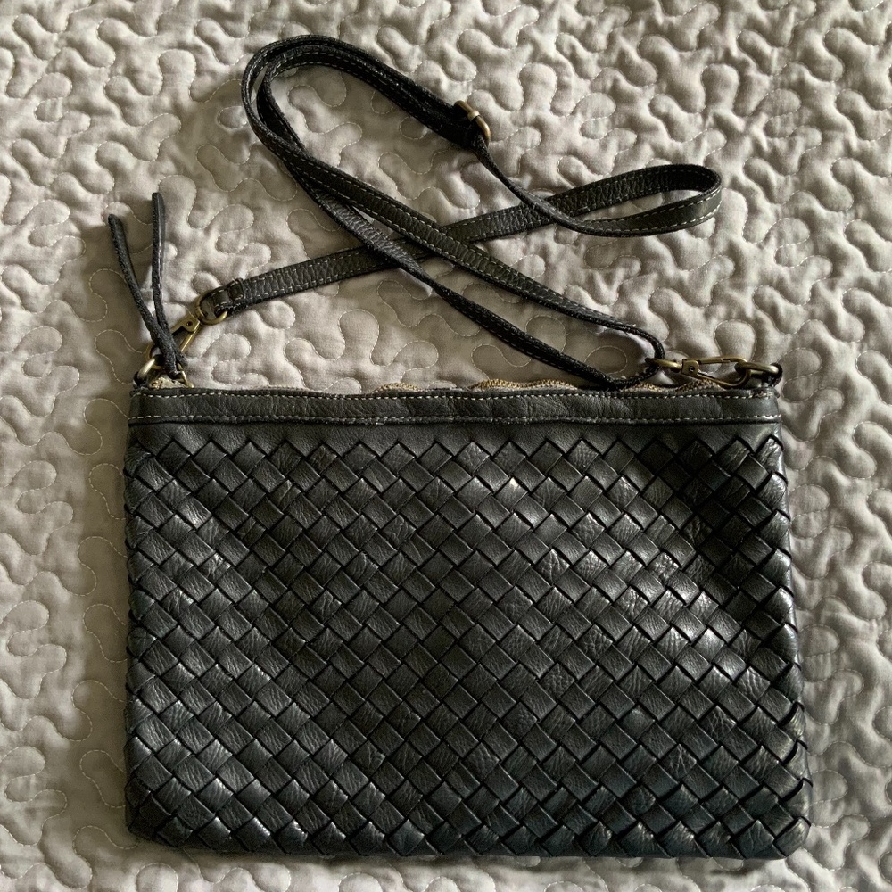 Clutch woven leather handbag